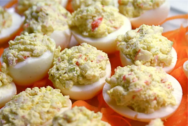 Why There's Always Red Dust on the Deviled Eggs: A Potluck History